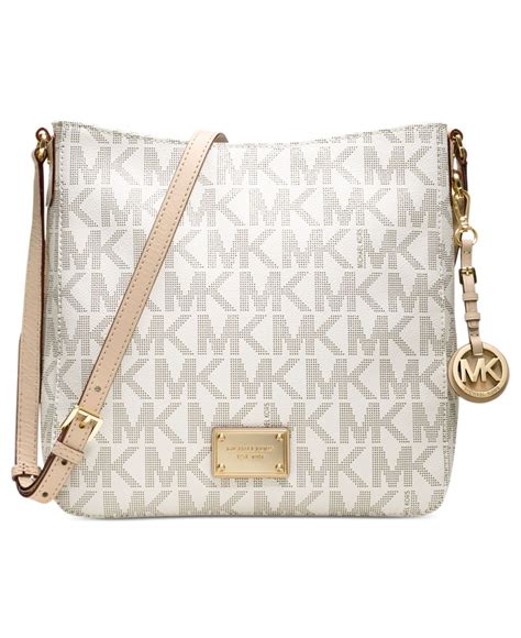 michael kors jet set crossbody real vs fake|michael kors vanilla jet set.